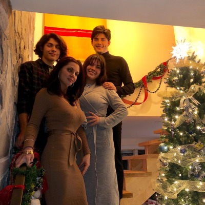 Lucius Hoyos and his family celebrating christmas.